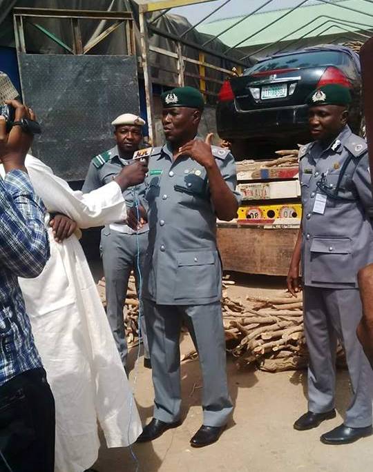 Nigeria customs intercept car smuugled within bundles of firewood