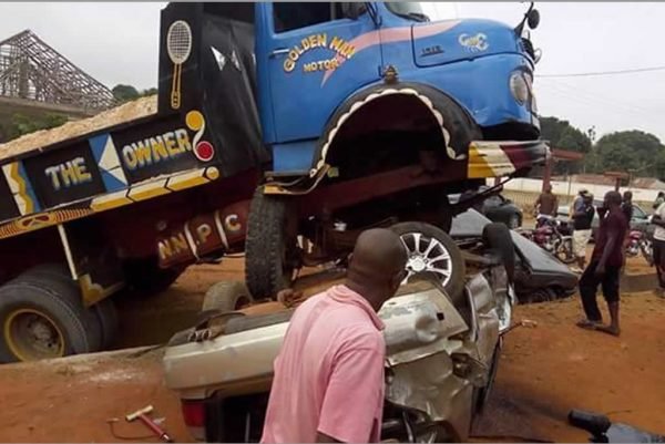 truck crushes car