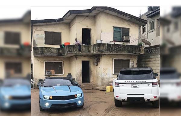 luxurious-cars-at-an-old-house