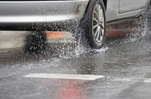 car driving in the rain