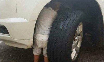 kid under car