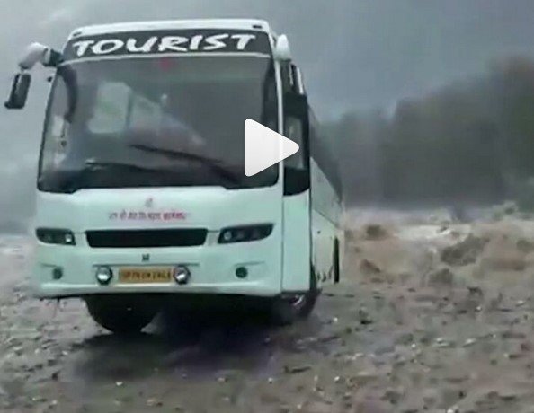 luxurious bus swept away by flood