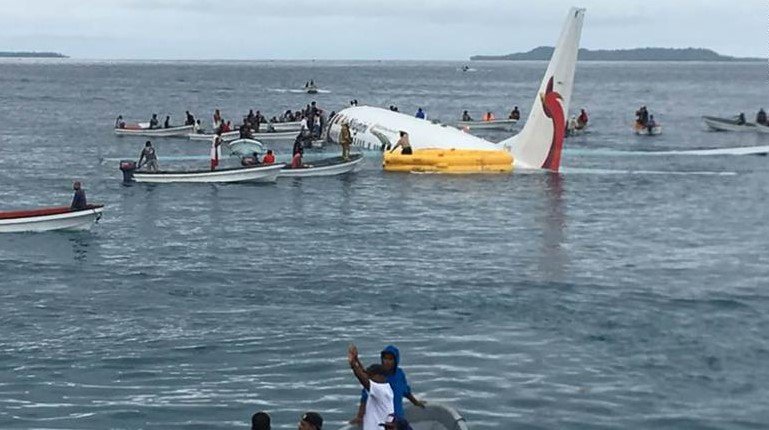 plane overshoots runway