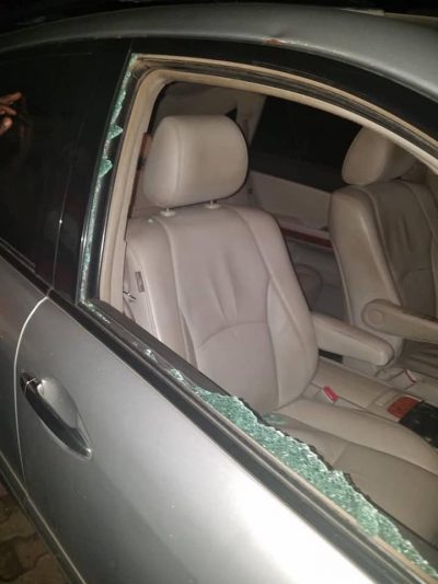 bashed car by traffic robbers