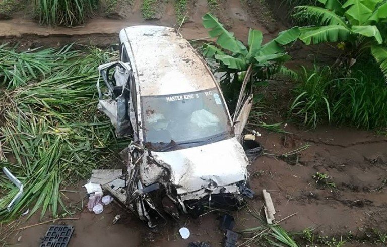 car veers off bridge