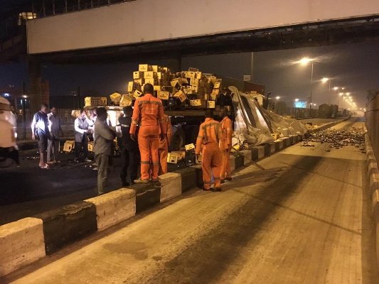 container hit truck