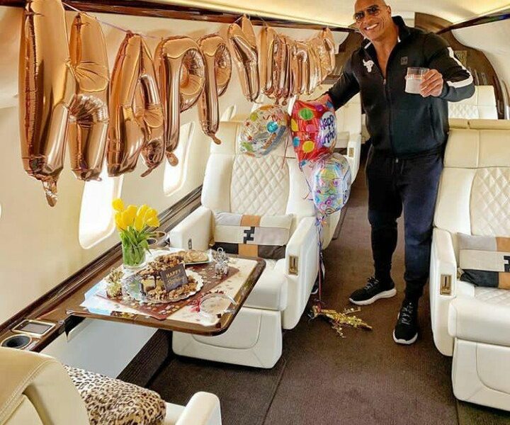 'The Rock' Celebrates His Birthday In His Private Jet (Photos)