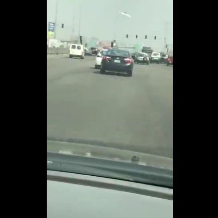 driver dribbles police car