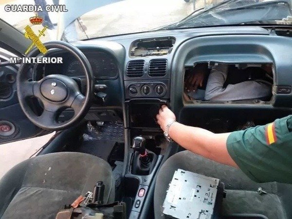 African-migrants-engine-dashboard-rear-seat