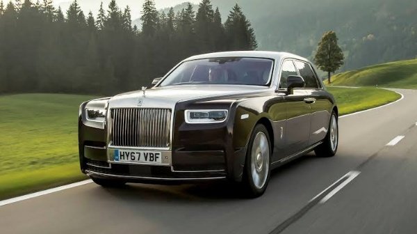 Interior view of new a very expensive Rolls Royce Phantom car a long black  limousine with dashboard steering wheel seats on parking Photos  Adobe  Stock