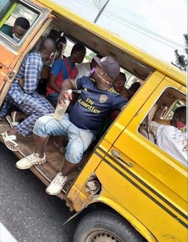 conductor-of-a-commercial-bus-spotted-with-hand-sanitizer-and-face-mask