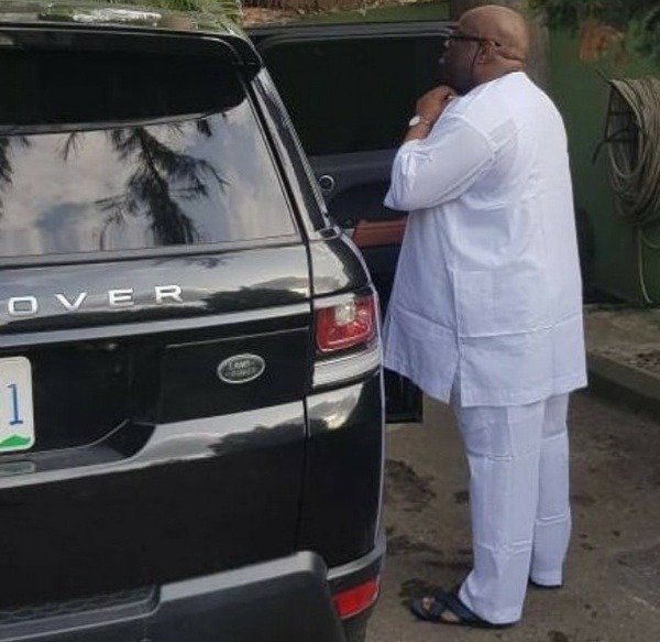 dele-momodu-is-60-today-take-a-look-at-a-rare-picture-of-him-posing-with-a-bentley-and-range-rover-cars