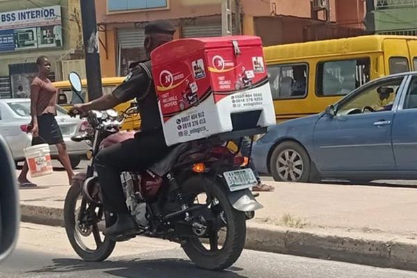Police Officer Spotted Riding A Dispatch Bike In Lagos