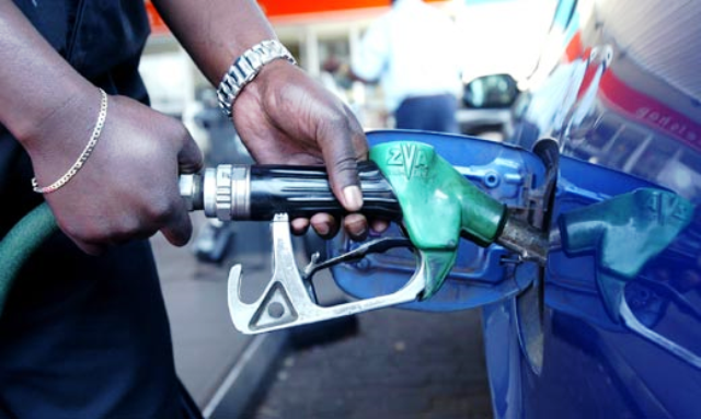 Filling Stations Dispensing Gas In Cars