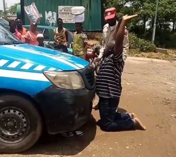 knock-me-down-man-kneels-in-front-of-frsc-van-seized-license