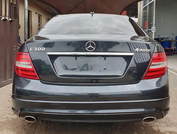 Nigerian Car Tuner, Khaz Customs Brings Dead Mercedes C-Class Back To Life