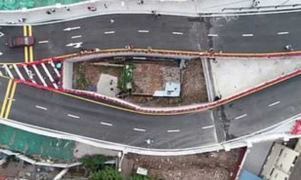 motorway-built-around-tiny-house-china