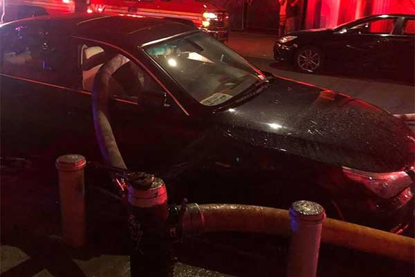 Firefighters Smash Windows Of A BMW Parked In Front Of Fire Hydrant