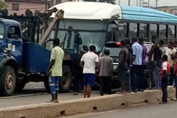 See How A BRT Crushed Two Lagosians To Death Between Iyana Ipaja And Ile Epo Road