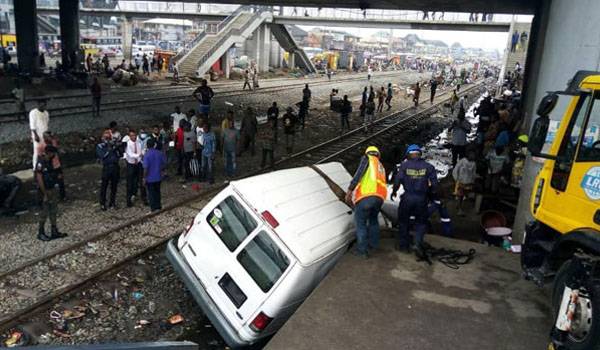 BREAKING: Ford Bus Collides With Moving Train At Oshodi 