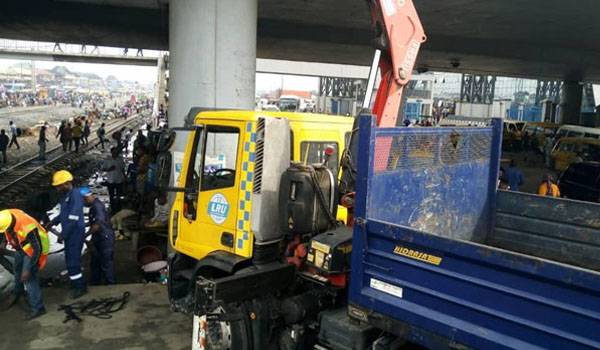 BREAKING: Ford Bus Collides With Moving Train At Oshodi 