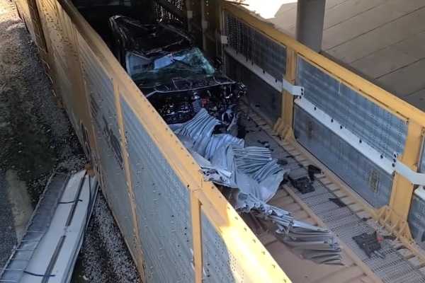 brand-new-cars-destroyed-after-ford-train-crashes-bridge