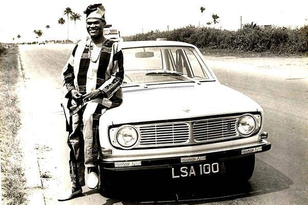 Legendary Nigerian Icon, Late Hubert Ogunde Poses With His Volvo 144