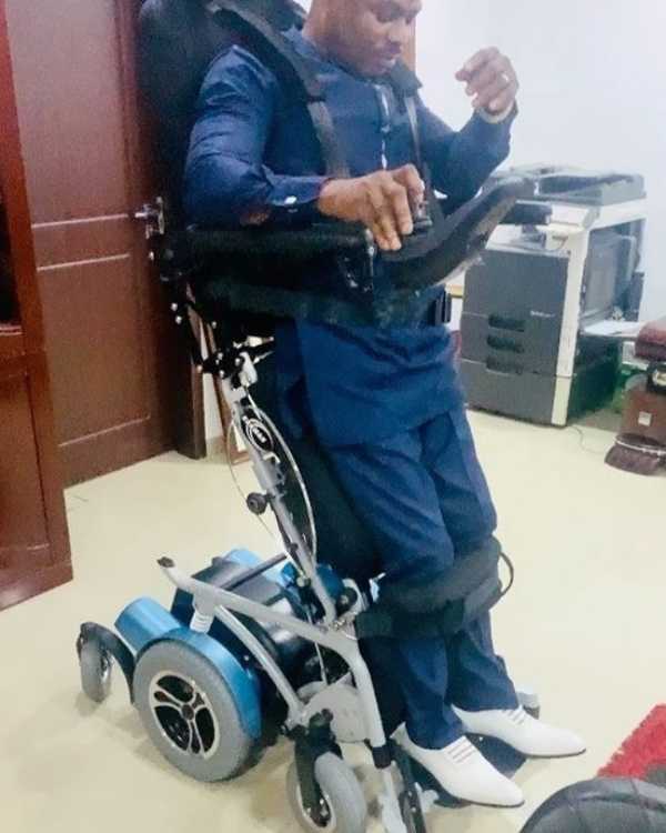yinka-ayefele-stands-on-his-feet-again-watch-him-cruise-on-his-power-standing-wheelchair