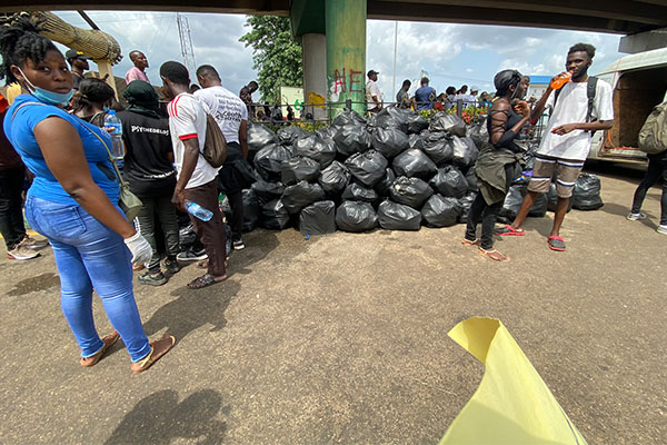 #EndsarsProtest: See How Protesting Nigerian Youths Who The President Calls Lazy Are Cleaning Protesting Ground (PHOTOS)