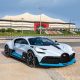 first-bugatti-divo-in-qatar-poses-in-front-of-stadium