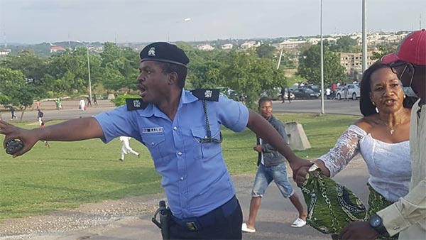 Policeman Carried On Shoulders Of Protesters For Saving A Woman From Being Harassed In Abuja