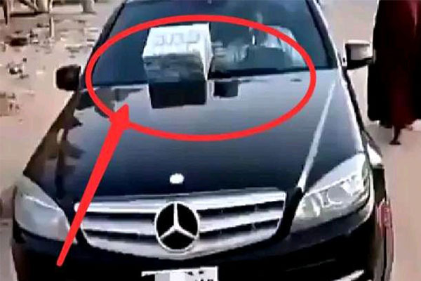 Moment When Man Used Mercedes-Benz C300 Worth 3.5Million To Hawk Herbal Product In Kaduna (PHOTOS