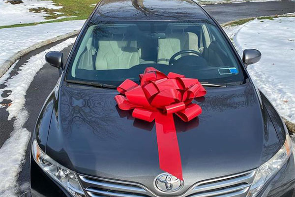 Popular Nigerian Actress, Sonia Ogiri Presents Mother Toyota Venza As Christmas Gift (PHOTOS)