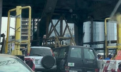 Two Cars Wedged Into One Another As They Battle To Pass Through Ticketing Line At Lekki Tollgate - autojosh