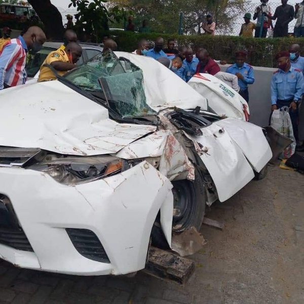 No Casualties As Two 20-ft Containers Fall Off The Road In Lagos; Crush Toyota Corolla Sedan Car - autojosh 