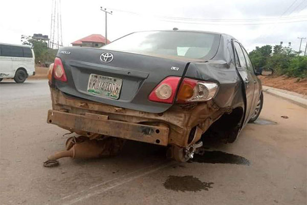 10 Escape Death After An Overtaking Corolla Crashed Into “Access Road Island” And Highlander In Anambra - autojosh