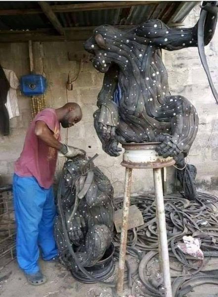Nigerian Makes Sculptures Of Animals, Including Gorilla, Crocodile, Out Of Worn-out And Discarded Car Tyres - autojosh 