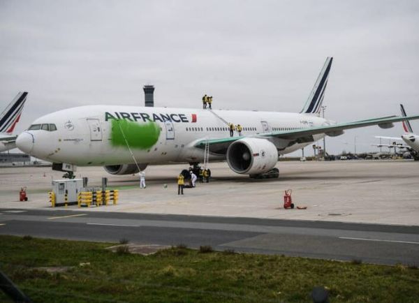 Breaking: Protesters Vandalize Air France 777 Aircraft With Green Paints At Paris Airport - autojosh 