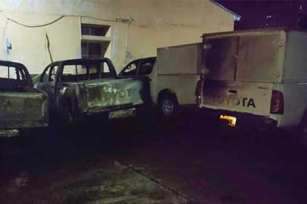 Hoodlums Attack INEC Office In Enugu, Burnt Six Toyota Hilux, Damage Two Other Vehicles - autojosh