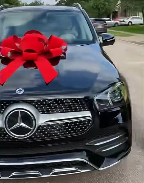 Reactions As Nigerian Lady Gift Her Mum Mercedes GLE SUV, $5k Cash - autojosh 