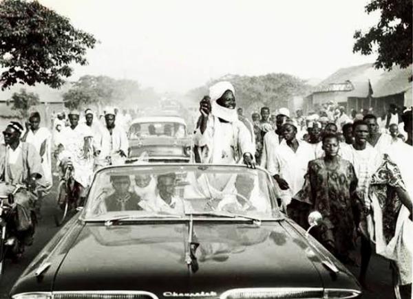 Throwback : Sir Ahmadu Bello On A Boat Cruise To Kainji Dam Site Before Construction Began In 1964 - autojosh 
