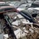 Nigerian Car Dealer In Tears After A Fence Collapsed On 6 Vehicles - autojosh