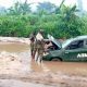 Nigerian Soldiers Struggles To Extract Toyota Hilux Pickup Truck Stuck In The Mud - autojosh