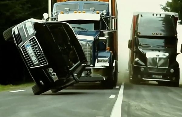 Transporter 3 Audi A8 Drove On Two Wheels Between Two Trucks During A 