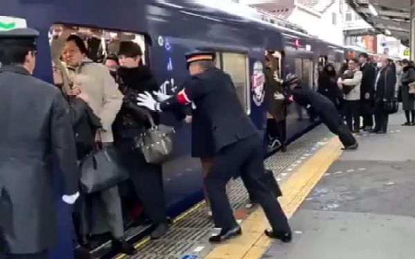 Watch As Commuters In Japan Struggles To Find Space Inside Bullet Trains During Rush Hour - autojosh 