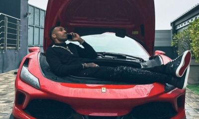 Arsenal Star Aubameyang Poses In The Front Boot Of His Red Ferrari LaFerrari Worth ₦1.4 Billion - autojosh