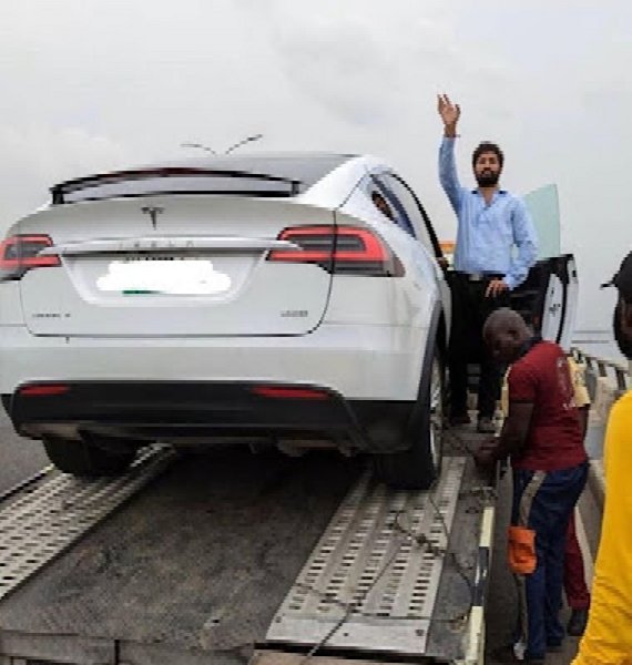 Reactions As Car Carrier Rescues Tesla Model X After Running Out Of Battery Juice On 3rd Mainland Bridge - autojosh 