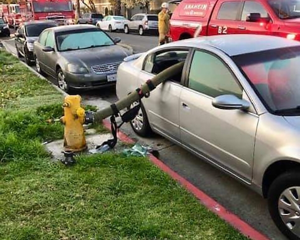 Reactions As Firefighters Chose To Break A Car’s Windows To Pass A Hose For Blocking Fire Hydrant - autojosh 