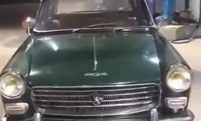 A 'Clean' Vintage 1962 Peugeot 404 Turn Heads At A Filling Station In Abuja - autojosh