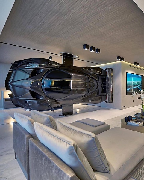 Car Collector Hang A $2.8 Million Pagani Zonda On The Wall Of His Living Room - autojosh 